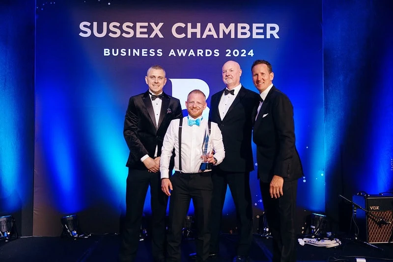ILG team presenting award